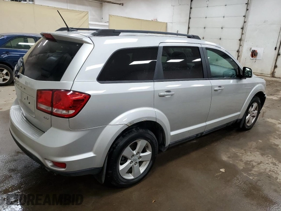 2012 Dodge Journey SXT с VIN 3C4PDCCG4CT133946, выставлен на аукционе Copart как лот 77002184 с пробегом 118 985 миль миль и Чистый • Clean title. История ставок и продаж доступна на DreamBid. Изображение 3.