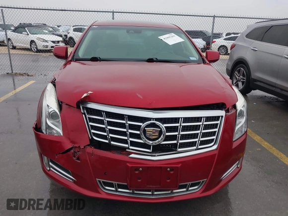 2013 Cadillac XTS Luxury with VIN 2G61P5S32D9115640, listed as a IAAI auction lot 41065284 with 125,643 mi miles and . Bid and sale history available at carsss.com. Image 12.