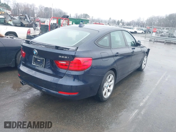 2015 BMW 3 Series 328i Gran Turismo xDrive with VIN WBA3X5C5XFD562161, listed as a IAAI auction lot 41570204 with 71,405 mi miles and . Bid and sale history available at DreamBid. Image 4.