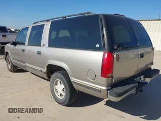 1999 Chevrolet Suburban with VIN 3GNEC16RXXG111175, listed as a IAAI auction lot 41193569 with 276,326 mi miles and . Bid and sale history available at DreamBid. Image 3.