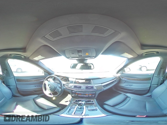 2015 BMW 7 Series 740i с VIN WBAYA6C58FD827009, выставлен на аукционе Copart как лот 50223755 с пробегом 105 440 миль миль и Списание • Salvage title. История ставок и продаж доступна на DreamBid. Изображение 13.