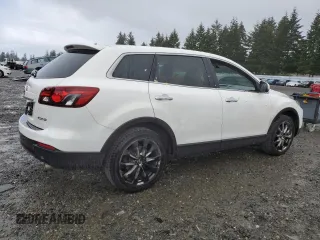 2014 Mazda CX-9 Grand Touring with VIN JM3TB2DA5E0438288, listed as a Copart auction lot 56970705 with 147,526 mi miles and Salvage title. Bid and sale history available at DreamBid. Image 3.