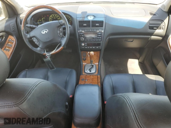 2003 Infiniti I35 Luxury z VIN JNKDA31A73T115221, wystawiony jako Copart lot #47275925 z przebiegiem 72 851 mil mil oraz Czysty tytuł • Clean title. Historia ofert i sprzedaży dostępna na DreamBid. Obrazek 8.