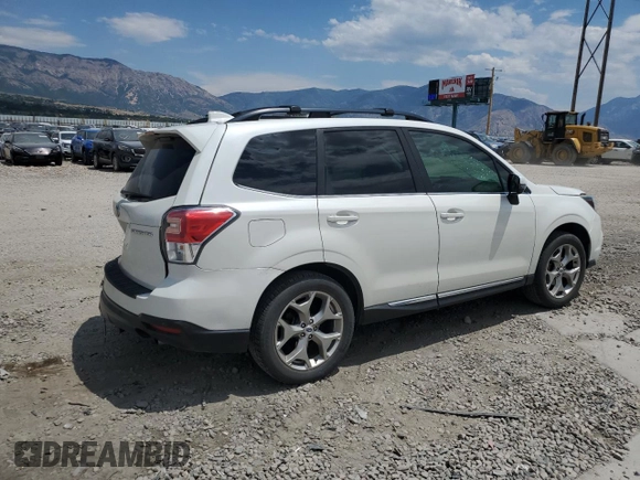 2018 Subaru Forester Touring with VIN JF2SJAWC4JH435749, listed as a Copart auction lot 63526465 with 143,029 mi miles and Salvage title. Bid and sale history available at DreamBid. Image 3.