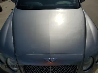 2006 Bentley Continental GT GT z VIN SCBCR63W76C037174, wystawiony jako Copart lot #79240794 z przebiegiem 103 577 mil mil oraz Nie do naprawy. Historia ofert i sprzedaży dostępna na DreamBid. Obrazek 11.