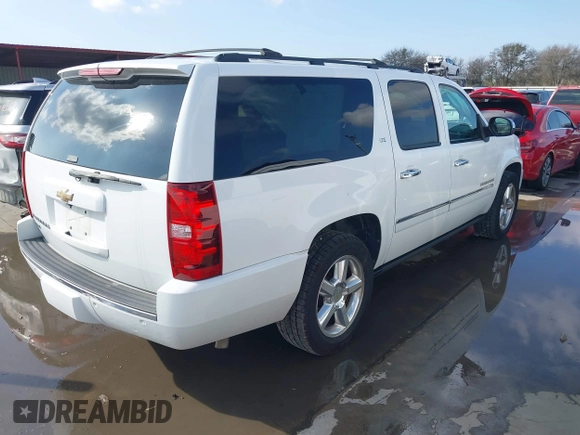 2010 Chevrolet Suburban LTZ with VIN 1GNUKKE34AR189475, listed as a IAAI auction lot 41179252 with 127,132 mi miles. Bid and sale history available at carsss.com. Image 4.