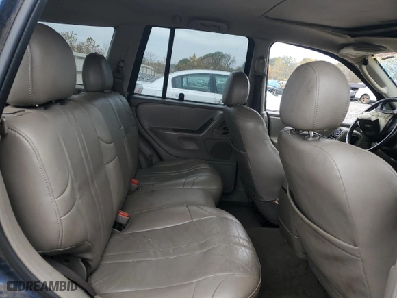 2002 Jeep Grand Cherokee Laredo with VIN 1J4GW48N02C165868, listed as a Copart auction lot 82228494 with 0 mi miles and Salvage Title. Bid and sale history available at carsss.com. Image 10.