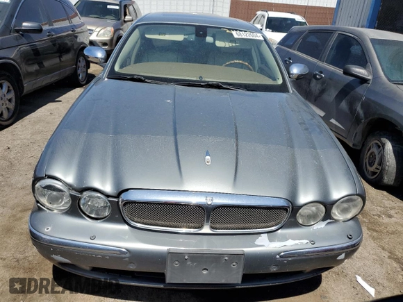 2006 Jaguar XJ Vanden Plas with VIN SAJWA82BX6SH09069, listed as a Copart auction lot 68122604 with 153,999 mi miles and Salvage Title. Bid and sale history available at carsss.com. Image 5.