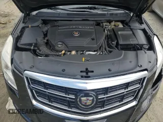 2014 Cadillac XTS Platinum z VIN 2G61W5S86E9151010, wystawiony jako Copart lot #58155335 z przebiegiem 48 437 mil mil oraz Szkoda całkowita • Salvage title. Historia ofert i sprzedaży dostępna na DreamBid. Obrazek 11.
