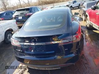 2013 Tesla Model S with VIN 5YJSA1CG2DFP14689, listed as a IAAI auction lot 41648508 with 98,578 mi miles and . Bid and sale history available at carsss.com. Image 15.