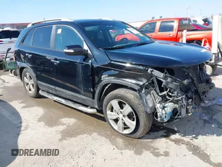 2012 Kia Sorento EX with VIN 5XYKU3A64CG244735, listed as a IAAI auction lot 41650809 with 146,977 mi miles and . Bid and sale history available at DreamBid. Image 1.