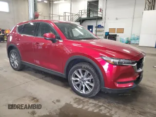 2020 Mazda CX-5 Grand Touring with VIN JM3KFBDM9L0760861, listed as a Copart auction lot 60977275 with 58,608 mi miles and Salvage title. Bid and sale history available at DreamBid. Image 4.