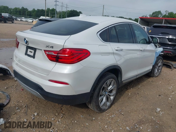 2015 BMW X4 xDrive28i with VIN 5UXXW3C51F0M86668, listed as a IAAI auction lot 42489071 with 59,694 mi miles and . Bid and sale history available at DreamBid. Image 4.