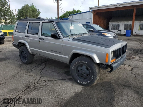 2000 Jeep Cherokee with VIN 1J4FF48S5YL172583, listed as a Copart auction lot 59605745 with 258,409 mi miles and Salvage title. Bid and sale history available at DreamBid. Image 4.