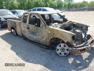 2004 Ford F-150 XLT with VIN 1FTPX145X4NA77392, listed as a IAAI auction lot 42072211 with Not provided miles and . Bid and sale history available at DreamBid. Image 1.