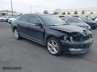 2013 Volkswagen Passat TDI SEL Premium with VIN 1VWCN7A38DC051554, listed as a IAAI auction lot 42011840 with 125,797 mi miles. Bid and sale history available at carsss.com. Image 1.