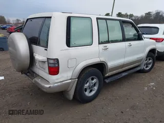 2002 Isuzu Trooper S with VIN JACDJ58X227J02390, listed as a IAAI auction lot 41125455 with 177,350 mi miles and . Bid and sale history available at DreamBid. Image 4.