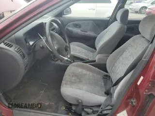 1997 Mitsubishi Mirage DE z VIN JA3AY26AXVU007285, wystawiony jako Copart lot #71958454 z przebiegiem 156 415 mil mil oraz Szkoda całkowita • Salvage title. Historia ofert i sprzedaży dostępna na DreamBid. Obrazek 7.