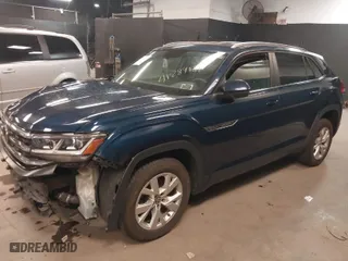 2021 Volkswagen Atlas Cross Sport 2.0T S with VIN 1V2GC2CA7MC214699, listed as a IAAI auction lot 41289089 with 59,073 mi miles. Bid and sale history available at carsss.com. Image 2.