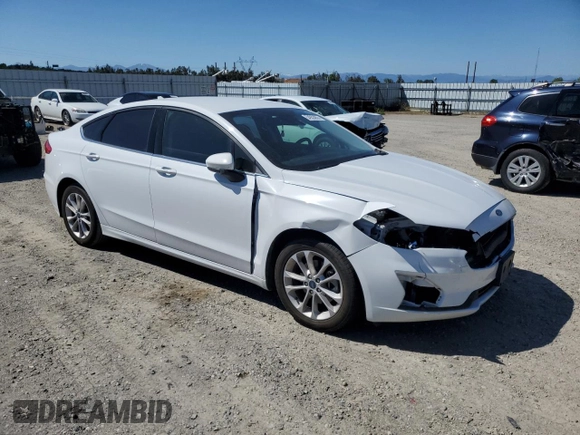 2020 Ford Fusion SE with VIN 3FA6P0LU0LR154013, listed as a Copart auction lot 54933055 with 122,197 mi miles and Salvage title. Bid and sale history available at DreamBid. Image 4.