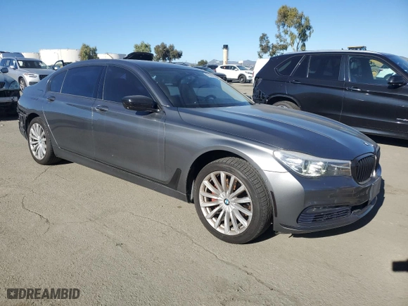 2016 BMW 7 Series 740i with VIN WBA7E2C51GG738763, listed as a Copart auction lot 87694035 with 91018 miles and Salvage Title. Bid and sale history available at carsss.com. Image 4.