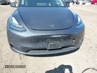 2022 Tesla Model Y Long Range with VIN 7SAYGDEE2NF460945, listed as a IAAI auction lot 41921645 with 62,318 mi miles and . Bid and sale history available at DreamBid. Image 11.