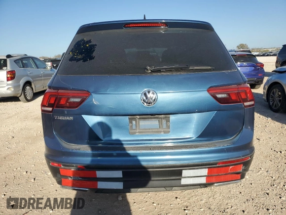 2020 Volkswagen Tiguan S z VIN 3VV1B7AX2LM059587, wystawiony jako Copart lot #48564695 z przebiegiem 178 661 mil mil oraz Czysty tytuł • Clean title. Historia ofert i sprzedaży dostępna na DreamBid. Obrazek 6.