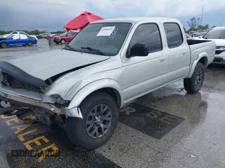 2003 Toyota Tacoma PreRunner z VIN 5TEGN92N13Z295384, wystawiony jako IAAI lot #42406105 z przebiegiem 194 171 mil mil oraz . Historia ofert i sprzedaży dostępna na DreamBid. Obrazek 17.