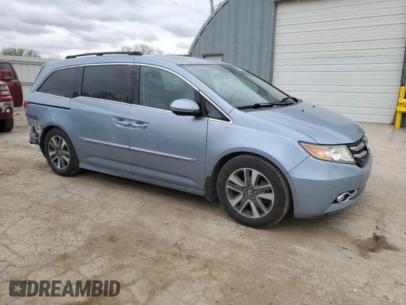 2014 Honda Odyssey Touring with VIN 5FNRL5H90EB007182, listed as a Copart auction lot 51152775 with 152,483 mi miles and Salvage title. Bid and sale history available at DreamBid. Image 4.