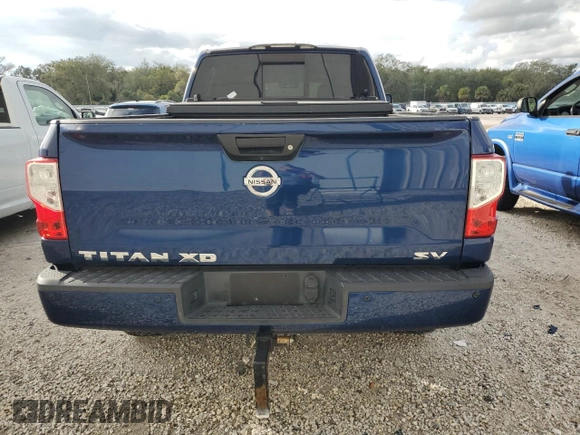 2017 Nissan Titan SL z VIN 1N6BA1F25HN514572, wystawiony jako Copart lot #85803054 z przebiegiem 79 904 mil mil oraz Czysty tytuł • Clean title. Historia ofert i sprzedaży dostępna na DreamBid. Obrazek 6.