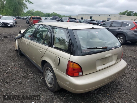 1997 Saturn SW z VIN 1G8ZK827XVZ120119, wystawiony jako Copart lot #57083245 z przebiegiem 199 971 mil mil oraz Szkoda całkowita • Salvage title. Historia ofert i sprzedaży dostępna na DreamBid. Obrazek 2.