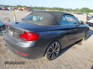 2020 BMW 2 Series 230i xDrive with VIN WBA2K1C08L7G28887, listed as a IAAI auction lot 42122785 with 30,599 mi miles and . Bid and sale history available at carsss.com. Image 4.