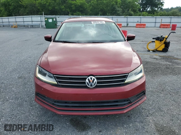 2017 Volkswagen Jetta S z VIN 3VW2B7AJXHM354102, wystawiony jako Copart lot #66042105 z przebiegiem 58 932 mil mil oraz Czysty tytuł • Clean title. Historia ofert i sprzedaży dostępna na DreamBid. Obrazek 5.
