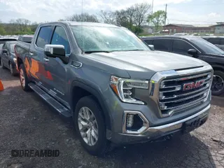 2021 GMC Sierra 1500 SLT z VIN 3GTU9DED4MG220866, wystawiony jako IAAI lot #41918595 z przebiegiem 12 981 mil mil oraz . Historia ofert i sprzedaży dostępna na DreamBid. Obrazek 1.