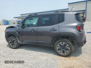 2016 Jeep Renegade Trailhawk with VIN ZACCJBCT5GPC75735, listed as a Copart auction lot 60299005 with 121,990 mi miles and Salvage title. Bid and sale history available at DreamBid. Image 2.