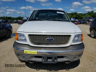 2004 Ford F-150 XL with VIN 2FTRX18W34CA64873, listed as a Copart auction lot 63946475 with 73,423 mi miles and Salvage title. Bid and sale history available at DreamBid. Image 5.