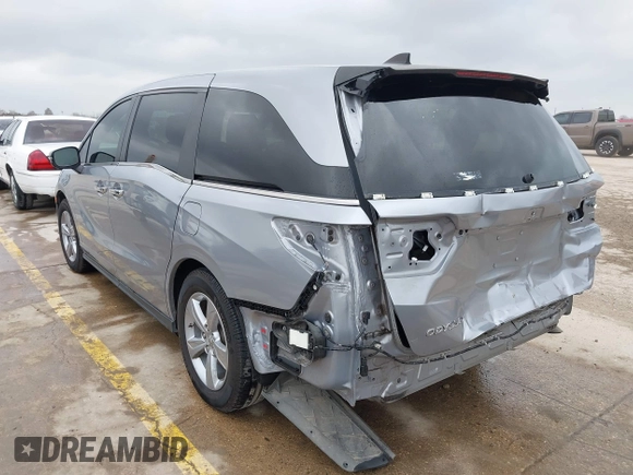 2018 Honda Odyssey EX-L with VIN 5FNRL6H73JB105024, listed as a IAAI auction lot 41663862 with 76,172 mi miles. Bid and sale history available at carsss.com. Image 3.