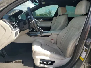 2019 BMW 7 Series 750i with VIN WBA7F0C53KGM24364, listed as a Copart auction lot 53947725 with 71,022 mi miles and Salvage Title. Bid and sale history available at carsss.com. Image 7.