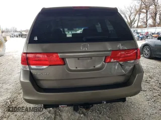2010 Honda Odyssey EX with VIN 5FNRL3H59AB038104, listed as a Copart auction lot 84688894 with 317,028 mi miles and Salvage title. Bid and sale history available at DreamBid. Image 6.