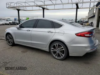 2019 Ford Fusion Titanium with VIN 3FA6P0D90KR187859, listed as a Copart auction lot 88341915 with 93,518 mi miles and Salvage Title. Bid and sale history available at carsss.com. Image 2.