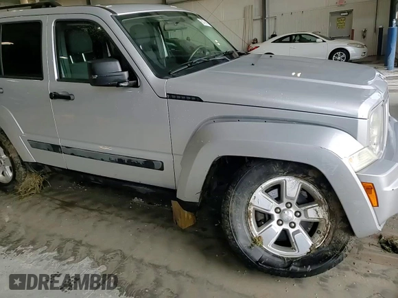 2011 Jeep Liberty Sport z VIN 1J4PN2GK6BW502136, wystawiony jako Copart lot #55778415 z przebiegiem 151 295 mil mil oraz Szkoda całkowita • Salvage title. Historia ofert i sprzedaży dostępna na DreamBid. Obrazek 14.
