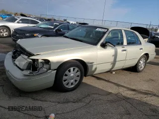 2004 Mercury Grand Marquis LS Premium z VIN 2MEHM75W64X694289, wystawiony jako Copart lot #53136235 z przebiegiem 131 917 mil mil oraz Szkody całkowita. Historia ofert i sprzedaży dostępna na DreamBid. Obrazek 1.