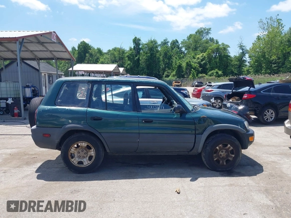 1998 Toyota RAV4 with VIN JT3GP10V6W0023680, listed as a IAAI auction lot 42235877 with 244,446 mi miles and . Bid and sale history available at DreamBid. Image 12.