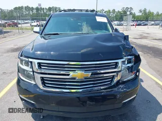 2019 Chevrolet Suburban LT with VIN 1GNSCJKC5KR304766, listed as a IAAI auction lot 42410264 with 105,171 mi miles and . Bid and sale history available at DreamBid. Image 12.