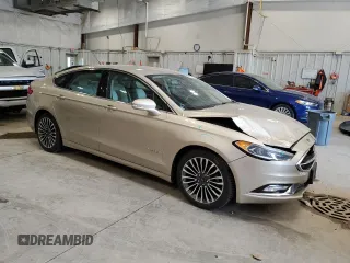 2017 Ford Fusion Hybrid Titanium with VIN 3FA6P0RU3HR360053, listed as a Copart auction lot 63063715 with 127,534 mi miles and Non repairable. Bid and sale history available at DreamBid. Image 4.