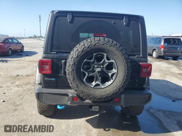 2023 Jeep Wrangler Rubicon z VIN 1C4JJXR62PW663711, wystawiony jako Copart lot #54816255 z przebiegiem 29 123 mil mil oraz Szkoda całkowita • Salvage title. Historia ofert i sprzedaży dostępna na DreamBid. Obrazek 6.