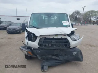 2019 Ford Transit with VIN 1FTYR2CM3KKA06742, listed as a IAAI auction lot 42062863 with 96,461 mi miles. Bid and sale history available at carsss.com. Image 13.