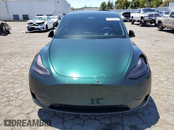 2022 Tesla Model Y Performance z VIN 7SAYGDEF2NF573979, wystawiony jako Copart lot #57778265 z przebiegiem 49 232 mil mil oraz Szkoda całkowita • Salvage title. Historia ofert i sprzedaży dostępna na DreamBid. Obrazek 5.