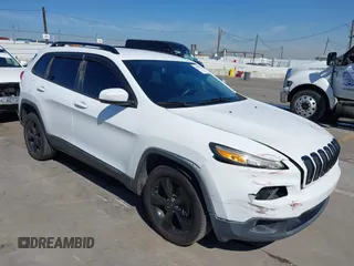 2016 Jeep Cherokee 75th Anniversary with VIN 1C4PJLCB9GW107422, listed as a IAAI auction lot 41997941 with 121,641 mi miles and . Bid and sale history available at carsss.com. Image 1.