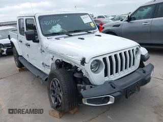2021 Jeep Gladiator High Altitude with VIN 1C6HJTFG8ML551570, listed as a IAAI auction lot 42229235 with 56,959 mi miles and . Bid and sale history available at DreamBid. Image 6.